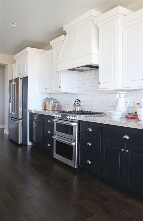 navy and white kitchen cabinets.